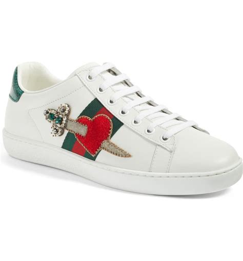 Gucci pierced heart ace sneakers